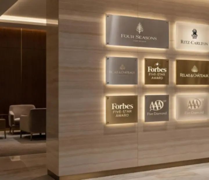 A wall of refined client and partner logos displayed inside the Czechroom venue.